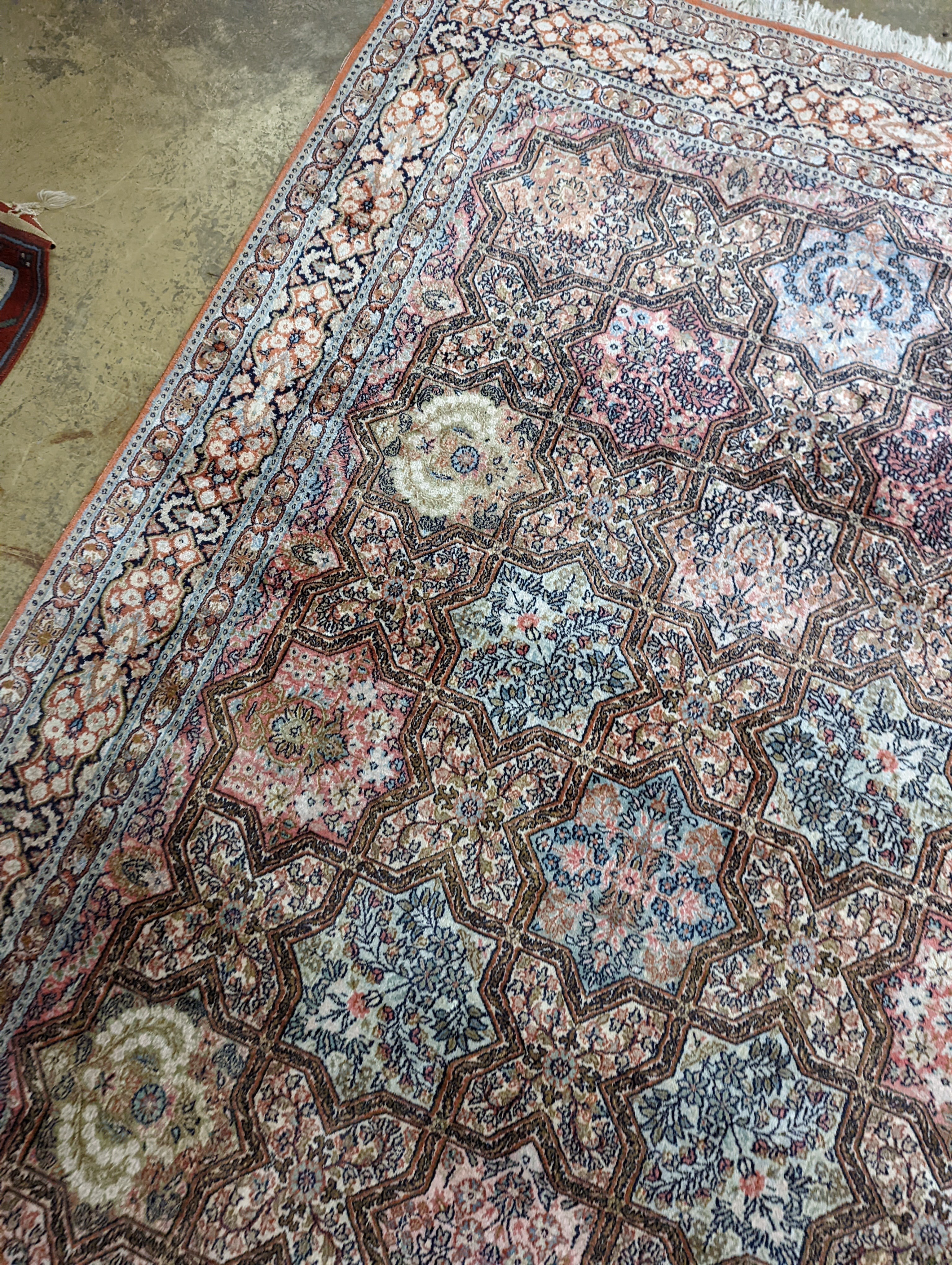 Two Turkish rugs and a Persian rugs. Largest, 284x172cm.